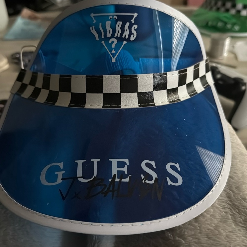 A Guess Visor one size fits all never worn